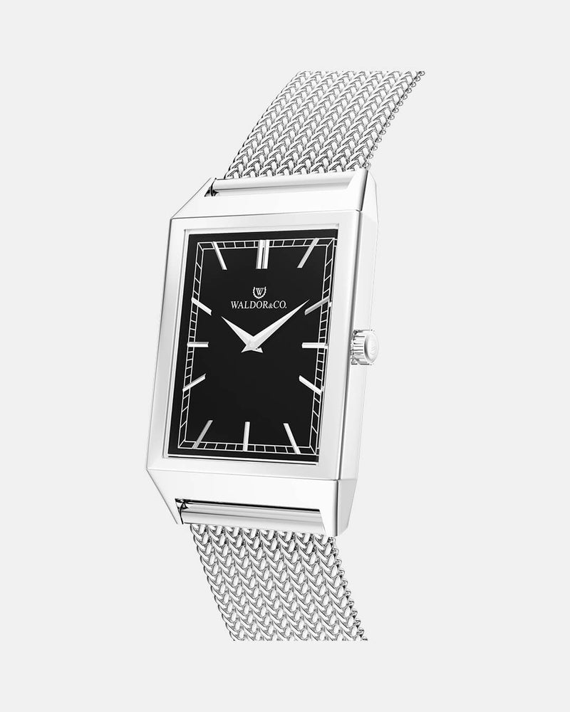A square mens watch in rhodium-plated silver from Waldor & Co. with black sunray dial. Seiko movement. The model is Conceptual 37 Antibes 29x43mm. 