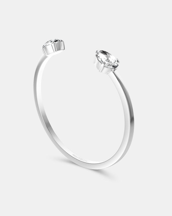 A polished stainless steel bangle in silver from Waldor & Co. One size. The model is Crystal Bangle Polished.