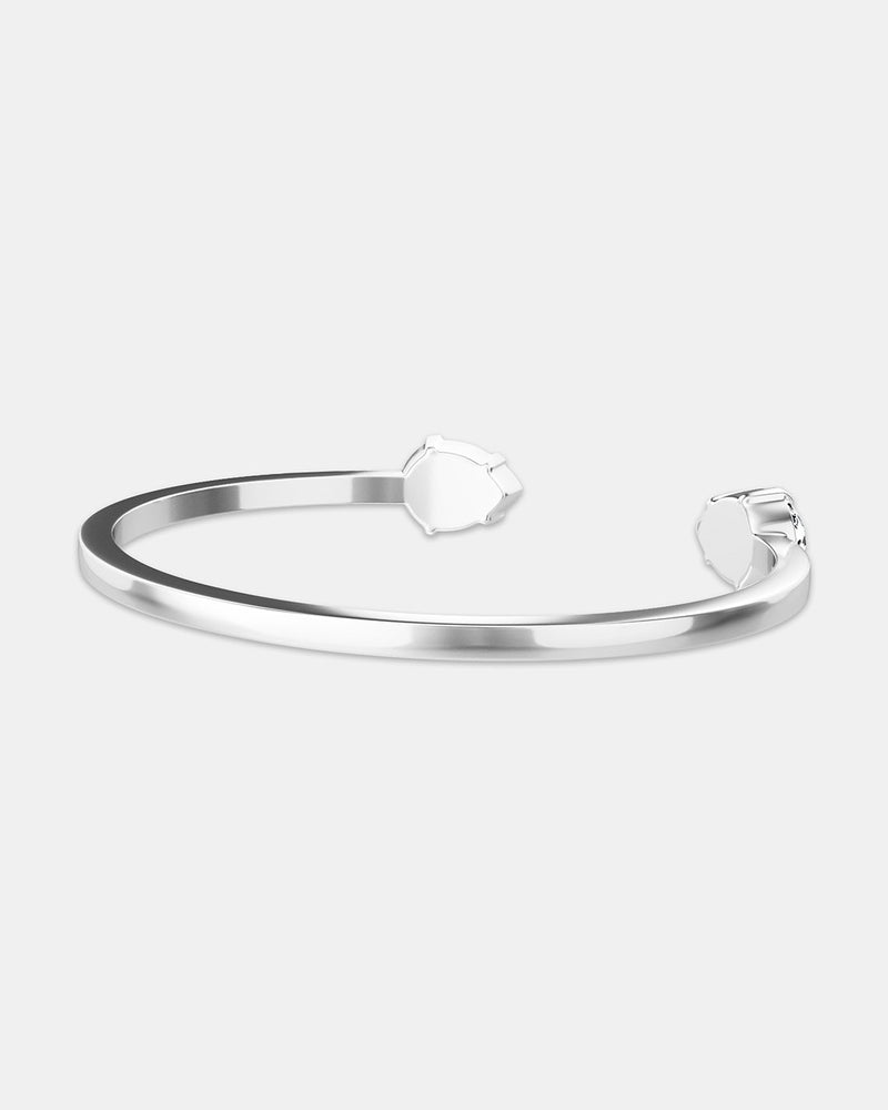 A polished stainless steel bangle in silver from Waldor & Co. One size. The model is Crystal Bangle Polished.