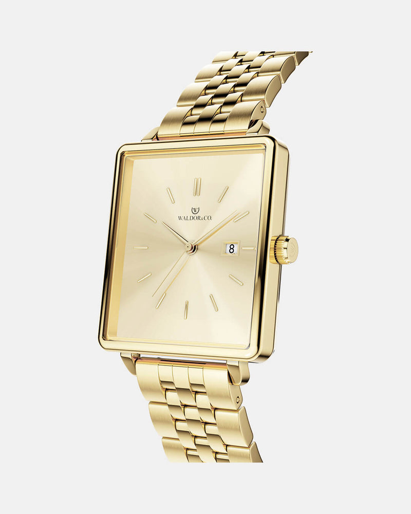 A square womens watch in 14k gold from Waldor & Co. with gold sunray dial and a second hand. Seiko movement. The model is Delight 32 Chelsea 28x32mm. 