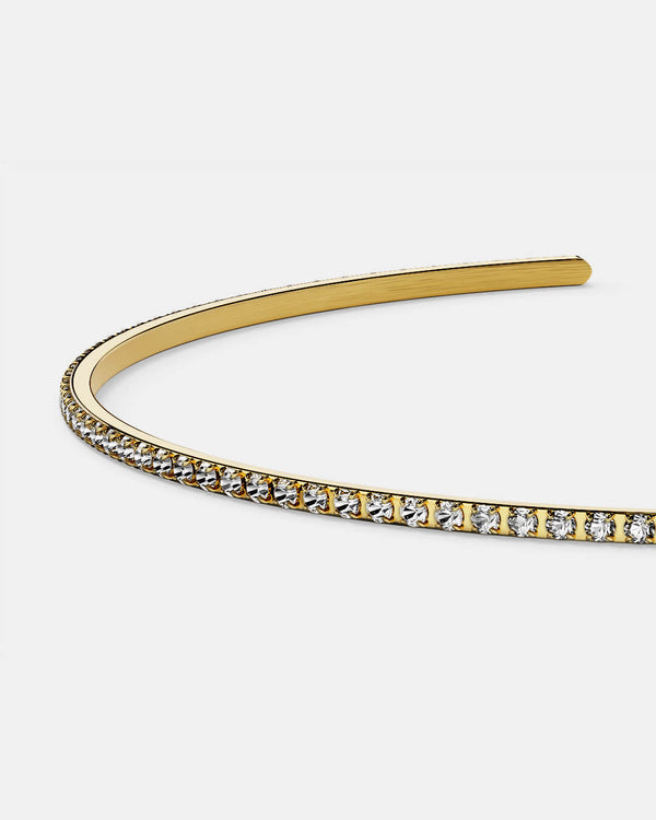 A Bangle in 14k gold-plated 316L stainless steel from Waldor & Co. One size. The model is Dulcet Bangle Polished.