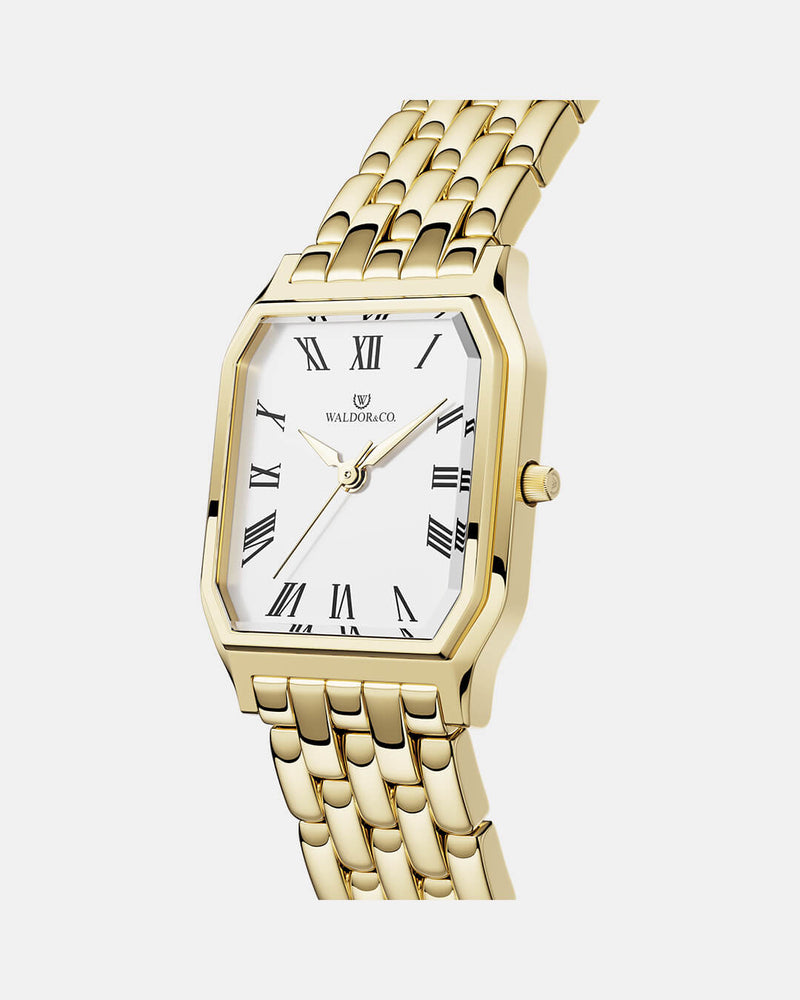 A square womens watch in 22k gold from Waldor & Co. with white Diamond Cut Sapphire Crystal glass dial. Seiko movement. The model is Eternal 22 Bellagio.