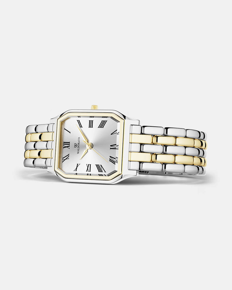 A square womens watch in 22k gold plated 316L stainless steel from Waldor & Co. with white Diamond Cut Sapphire Crystal glass dial. Seiko movement. The model is Eternal 22 Bellagio
