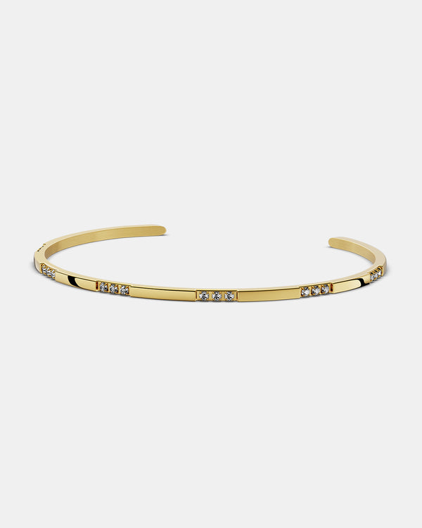A Bangle in 14k gold-plated 316L stainless steel from Waldor & Co. One size. The model is Opulent Bangle Polished.