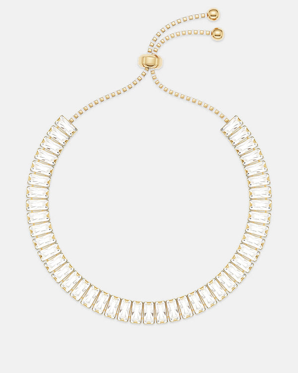 A polished stainless steel chain in 14k gold from Waldor & Co. One size. The model is Talia Diamond Chain Polished