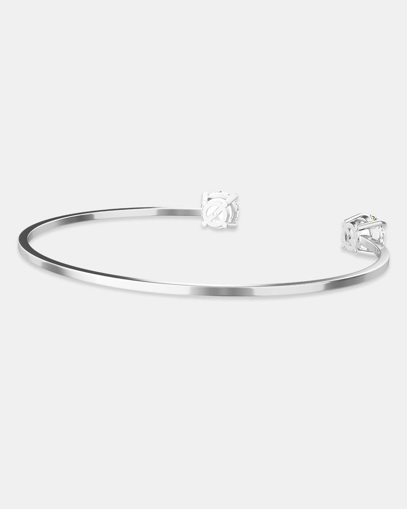 A polished stainless steel bangle in silver from Waldor & Co. One size. The model is Zircon Bangle Polished 